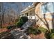 Stone front exterior with steps leading to a covered porch at 4286 Pool Rd, Winston, GA 30187