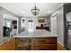 Kitchen island featuring a countertop and wooden cabinets at 4286 Pool Rd, Winston, GA 30187