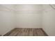 Walk-in closet with white walls and wire shelving at 3045 Flat Shoals Rd, Atlanta, GA 30349