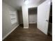Spacious bedroom with new flooring and built-in shelving at 1901 Oak Valley Rd, Decatur, GA 30035