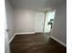 Simple dining area with hardwood floors and access to kitchen at 1901 Oak Valley Rd, Decatur, GA 30035