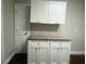 Bright kitchen with white cabinets and granite countertops at 1901 Oak Valley Rd, Decatur, GA 30035