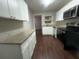 Renovated kitchen featuring granite countertops and new appliances at 1901 Oak Valley Rd, Decatur, GA 30035