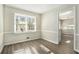 Bright dining room with hardwood floors and wainscoting at 4509 Central Dr, Stone Mountain, GA 30083