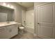 Bathroom with white vanity, shower, and bathtub at 1999 Gladys Ct, Marietta, GA 30064