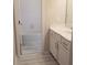 Bathroom with white vanity and shower/tub combo at 1999 Gladys Ct, Marietta, GA 30064