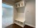 White cubby unit with bench seating and open shelving at 1999 Gladys Ct, Marietta, GA 30064