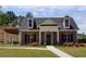 Brick home with pergola and landscaped yard at 1999 Gladys Ct, Marietta, GA 30064