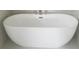 Modern freestanding bathtub with sleek, white finish at 1999 Gladys Ct, Marietta, GA 30064