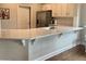 Kitchen with light-colored cabinets and quartz countertops at 1999 Gladys Ct, Marietta, GA 30064