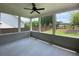 Spacious screened porch overlooking the backyard, complete with a ceiling fan at 1999 Gladys Ct, Marietta, GA 30064