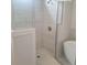 Walk-in shower with built-in seat and modern fixtures at 1999 Gladys Ct, Marietta, GA 30064