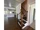 Wooden staircase with wrought iron balusters at 1999 Gladys Ct, Marietta, GA 30064