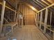 Unfinished attic with wood framing and flooring at 1999 Gladys Ct, Marietta, GA 30064