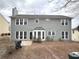 View of the back of the house shows the architectural design and placement of windows at 1999 Riverlanding Cir, Lawrenceville, GA 30046