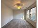 Bedroom featuring a ceiling fan, two large windows, and carpet flooring at 1999 Riverlanding Cir, Lawrenceville, GA 30046