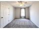 Bedroom with carpet flooring, a window with curtains, and neutral paint at 1999 Riverlanding Cir, Lawrenceville, GA 30046