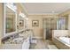 Elegant bathroom with double vanity, soaking tub, and shower at 925 Upper Hembree Rd, Roswell, GA 30076