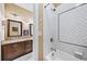 Clean bathroom with white subway tile shower and granite vanity at 925 Upper Hembree Rd, Roswell, GA 30076