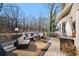 Relaxing deck with seating area overlooking wooded area at 925 Upper Hembree Rd, Roswell, GA 30076