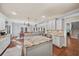 Spacious kitchen with granite island, stainless steel appliances, and white cabinets at 925 Upper Hembree Rd, Roswell, GA 30076