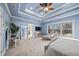 Spacious main bedroom with a coffered ceiling and large windows at 925 Upper Hembree Rd, Roswell, GA 30076