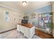 Home office with built-in shelving and a large desk at 925 Upper Hembree Rd, Roswell, GA 30076