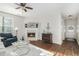 Cozy living room with fireplace and hardwood floors at 2098 Silhouette Ct, Villa Rica, GA 30180