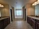 Large bathroom with double vanities, soaking tub, and separate shower at 965 Mulberry Bay Dr, Dacula, GA 30019