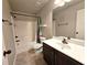 Small bathroom with shower/tub combo and single vanity at 965 Mulberry Bay Dr, Dacula, GA 30019