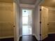 Hallway with access to bathroom and closets at 965 Mulberry Bay Dr, Dacula, GA 30019