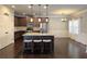 Modern kitchen boasts stainless steel appliances and granite countertops at 965 Mulberry Bay Dr, Dacula, GA 30019