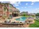 Stunning backyard with a large pool, spa, and patio perfect for outdoor entertaining at 3215 Kylee Dawn Cir, Lawrenceville, GA 30045