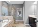 Bathroom boasts a soaking tub, shower, and double vanity at 1968 Perry Nw Blvd, Atlanta, GA 30318