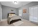 Bright bedroom with a queen bed and access to a deck at 1968 Perry Nw Blvd, Atlanta, GA 30318