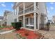 Covered porch with swing, landscaping, and walkway at 1968 Perry Nw Blvd, Atlanta, GA 30318