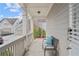 Covered front porch with a bench and view of the neighborhood at 1968 Perry Nw Blvd, Atlanta, GA 30318