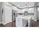 Modern kitchen with white cabinets, stainless steel appliances, and a large island at 1968 Perry Nw Blvd, Atlanta, GA 30318