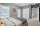 Spacious main bedroom with a king bed and private access to upper level at 1968 Perry Nw Blvd, Atlanta, GA 30318