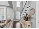 View of staircase from living room, with decorative console table at 1968 Perry Nw Blvd, Atlanta, GA 30318