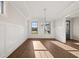 Formal dining room with hardwood floors and wainscoting at 739 Marlay Sw Ln, Powder Springs, GA 30127