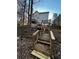 Wooden footbridge leading to backyard at 700 Somerset Vale Dr, Lawrenceville, GA 30044