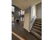 Two-story foyer with hardwood floors and staircase at 700 Somerset Vale Dr, Lawrenceville, GA 30044