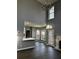 Open concept kitchen with island and breakfast area at 700 Somerset Vale Dr, Lawrenceville, GA 30044