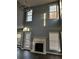 High ceiling living room with fireplace and hardwood floors at 700 Somerset Vale Dr, Lawrenceville, GA 30044