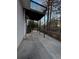 Large concrete patio with deck and stairs at 700 Somerset Vale Dr, Lawrenceville, GA 30044