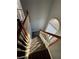 Elegant staircase with wood railings and carpeted steps at 700 Somerset Vale Dr, Lawrenceville, GA 30044