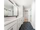 Elegant bathroom with double vanity and hexagon tile floors at 1706 Pardee Dr, Kennesaw, GA 30152