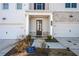 Townhome front entrance with stone accents, double doors and landscaping at 1706 Pardee Dr, Kennesaw, GA 30152