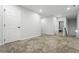 Spacious hallway with carpeted floor and neutral walls at 1706 Pardee Dr, Kennesaw, GA 30152